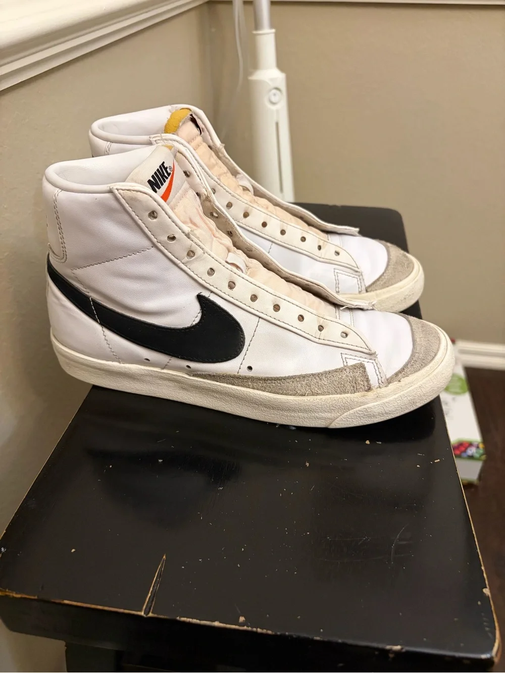 Nike White High-Top Sneakers with Black Swoosh and Tan Accents
